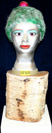 &quot;Disco Queen&quot; 2003 Styropor, Spachtelmasse, Kunsthaar, Sockel: Birke 62/25/22 mit Sockel 250,- 